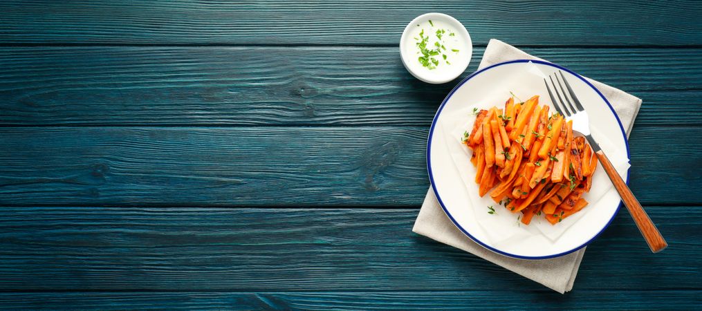 Concept of tasty food, fried sweet potato, space for text