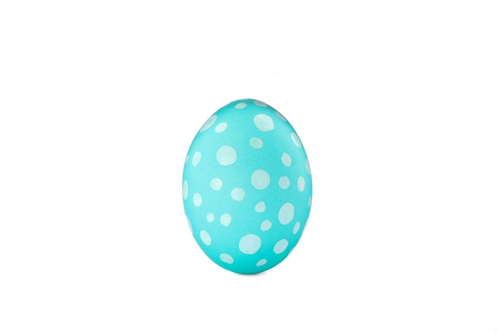 Decorative easter egg isolated on light background. Festive tradition