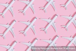 Passenger plane pattern on pastel pink background 5QKlnb