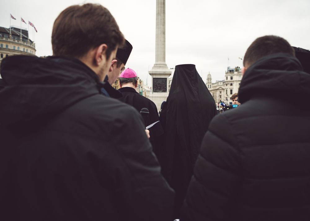 London, England, United Kingdom - March 5 2022: Back shot of group of men at anti-war protest