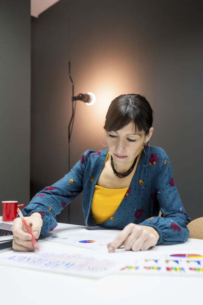Woman working with charts in office