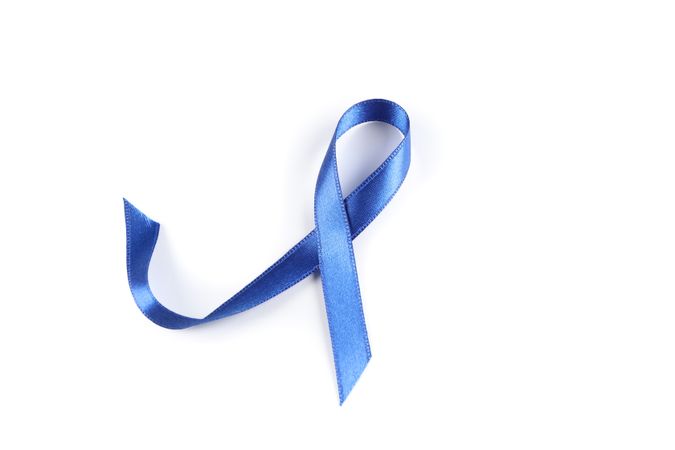 Blue awareness ribbon isolated on blank background