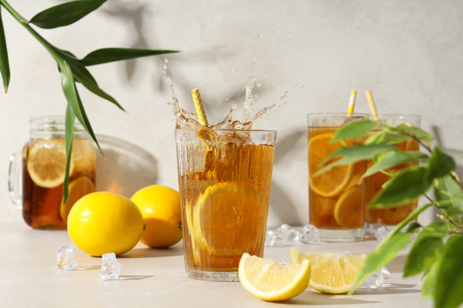 Cold tea with fresh oranges and mint leaves
