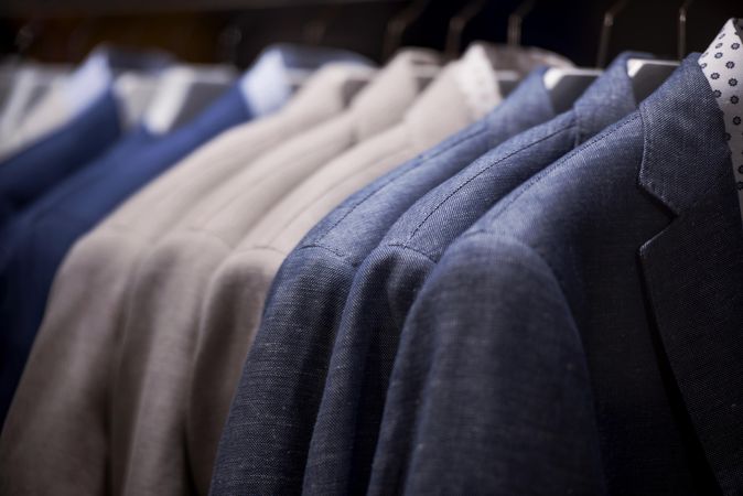 Clothes rack of dress shirt in close-up in fashion store