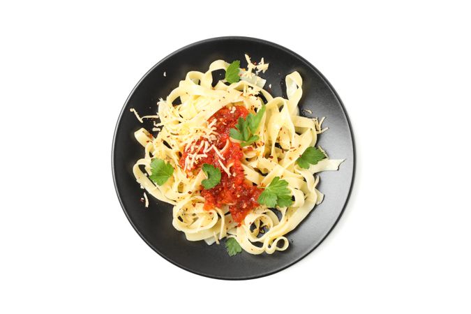 Plate with tasty pasta isolated on plain background