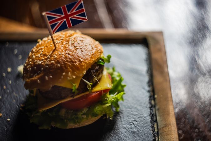 British hamburger on rustic background