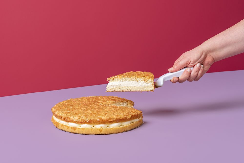 Almond cake minimalist on pink background