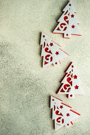 Christmas card concept of tree ornaments on concrete counter