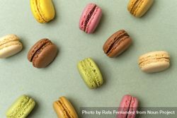 Above view of various macaroons on a marble background 5Q28Ag