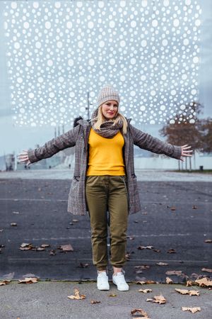 Blonde woman posing in the city
