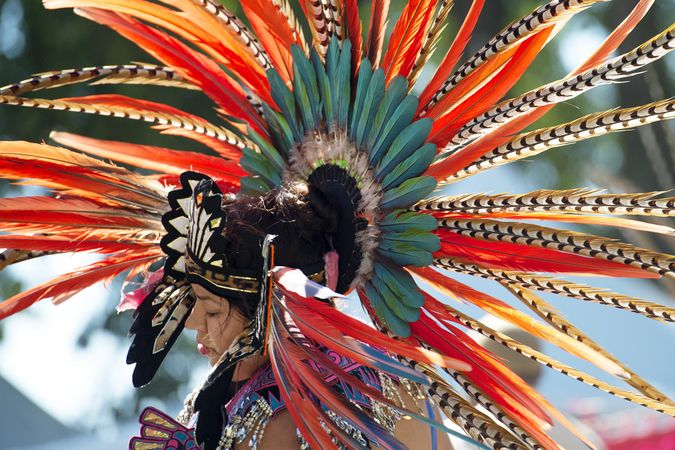 Des Moines, Iowa, USA - September 26, 2015: An Aztec heritage dancer wears traditional regalia
