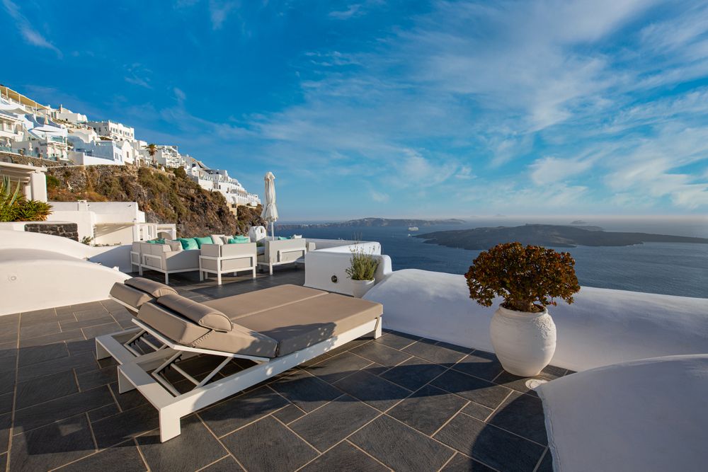 Reclining chairs overlooking the Aegean Sea in Santorini