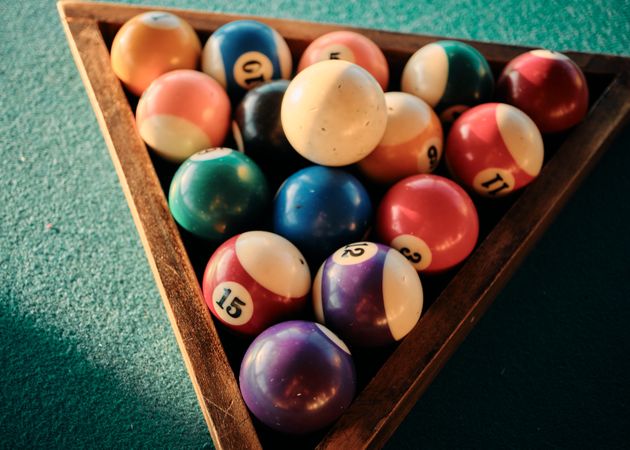 Looking down at rack of pool table balls