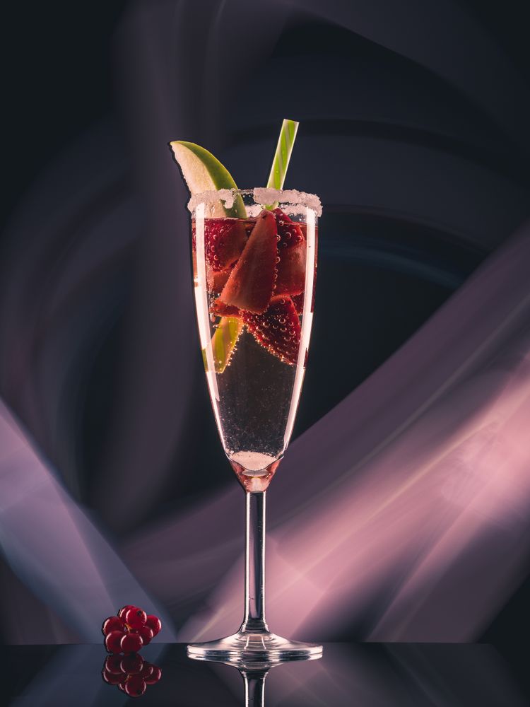 Glass with drink and berries