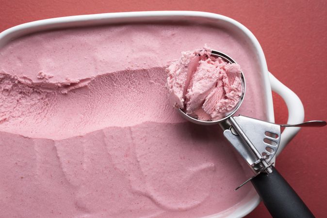 Pink ice cream scoop close-up