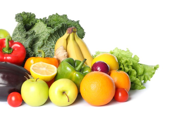 Composition with fresh vegetables and fruits isolated on blank background