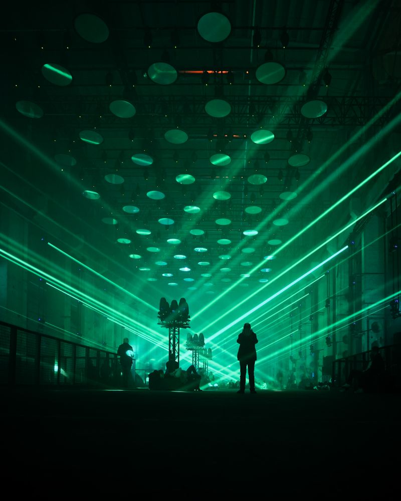 Silhouette of person standing on stage