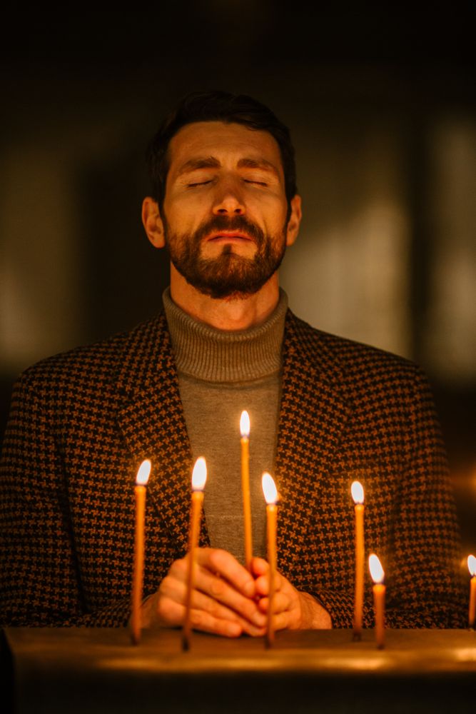 Parishioner Being Enlightened by the Teachings of Jesus Christ and Following his Path