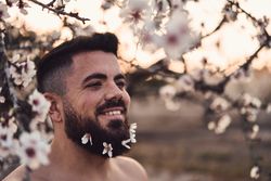 Man with flowers in beard