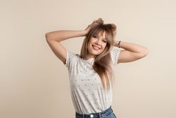 woman posing in pastel background