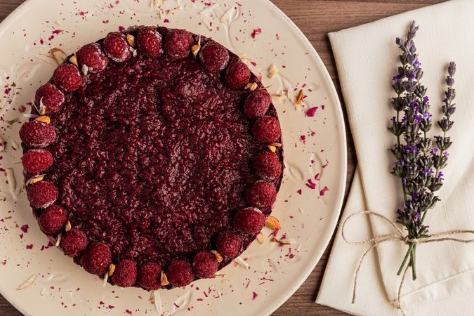 Fruit berry pie and branch of lavender on table