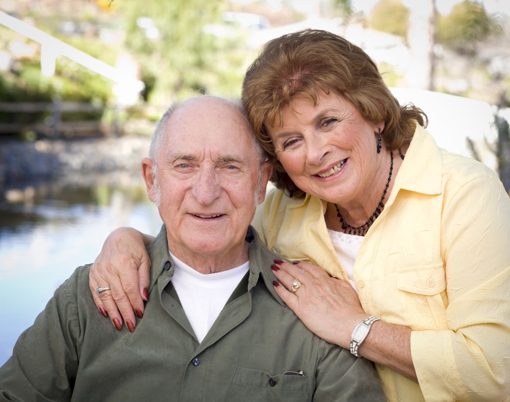 Happy Mature Couple Relaxing in The Park
