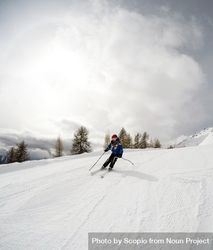 Person riding ski blades on snow covered ground 4B793b