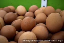 Close up of brown eggs for sale in market 0JGorN