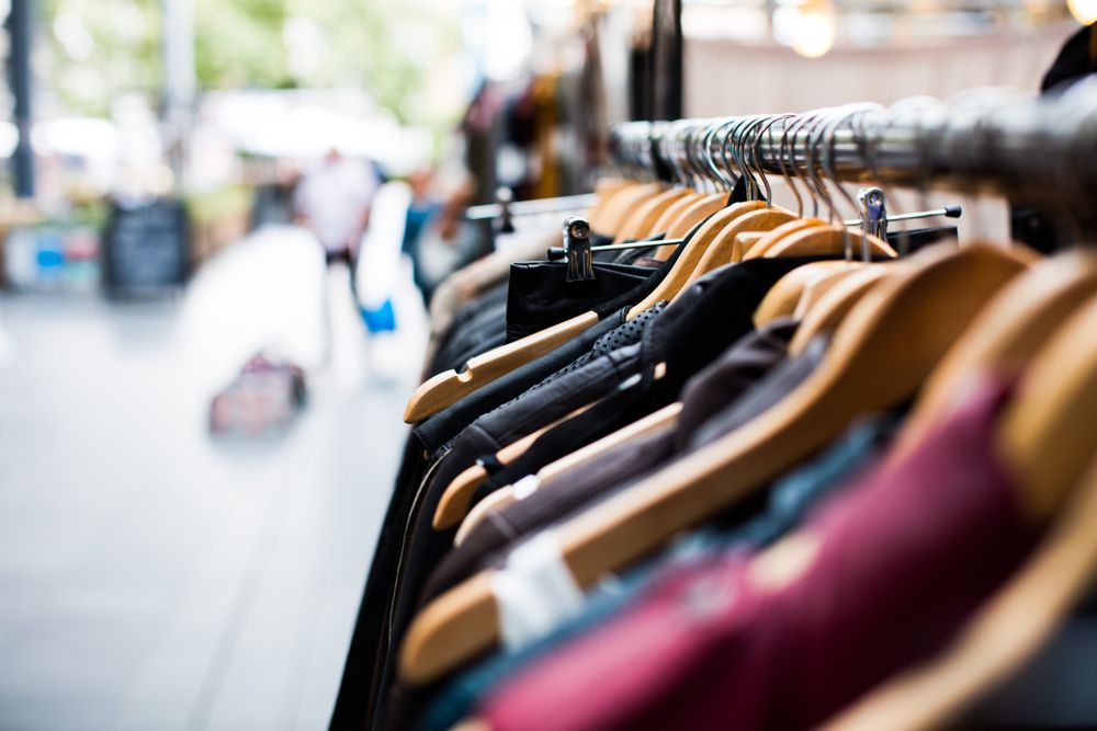 Clothes hanged on clothes hanger in fashion store