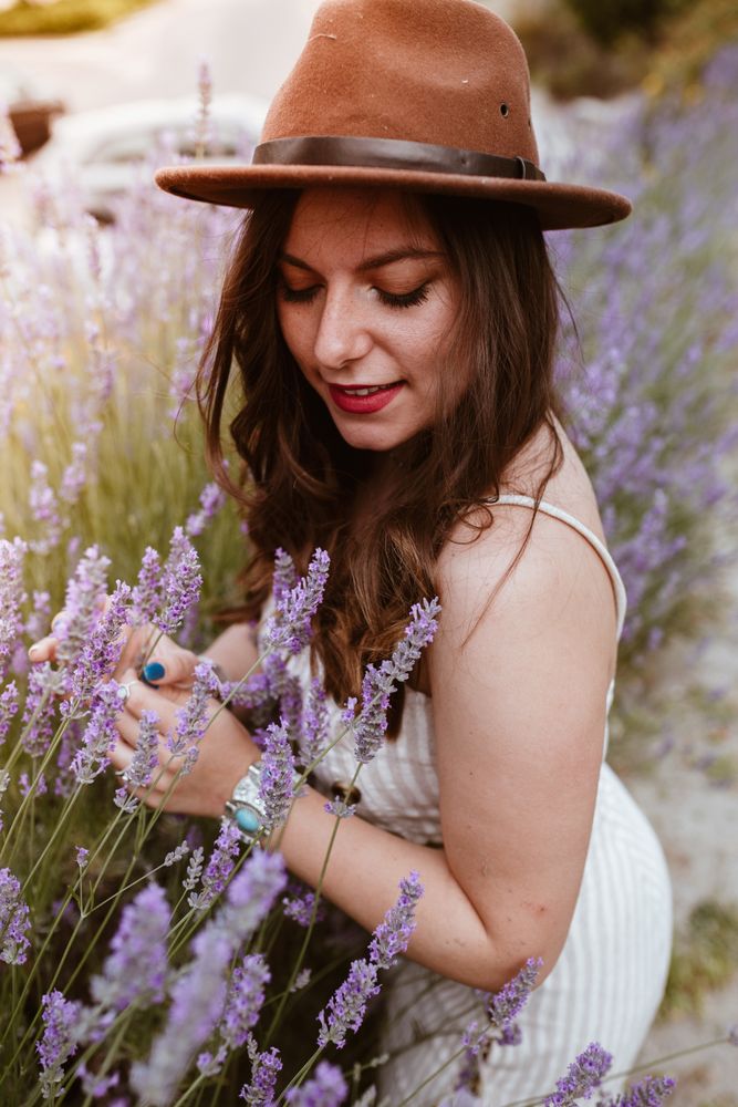 Woman with mysterious smile with eyes closed