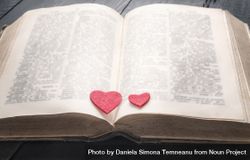 Antique book and two hearts on it 5kMyjb