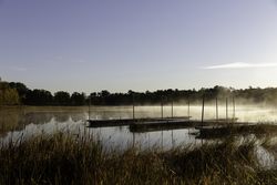 Fog and docks on Big Sandy Lake in McGregor, Minnesota