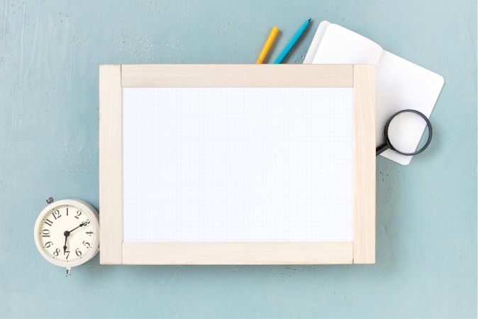 Writing board with note book and clock