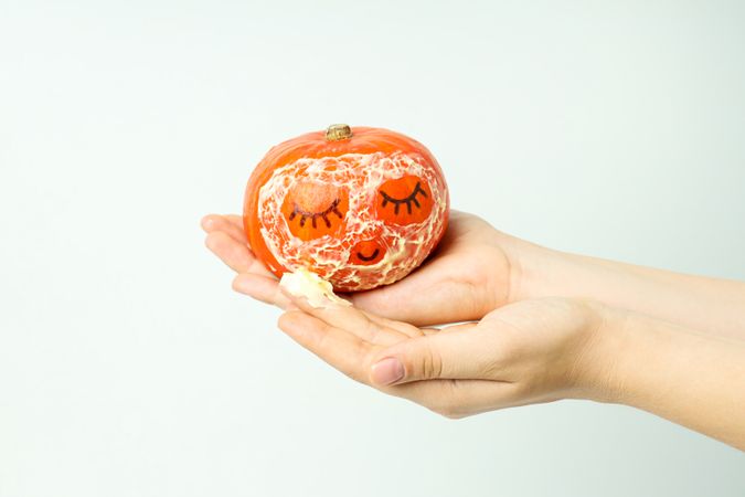 Skin care and face care concept - pumpkin cosmetic