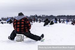 Nisswa, MN, USA - January 25th, 2020: Back shot of a male angler ice fishing 4d9Gab