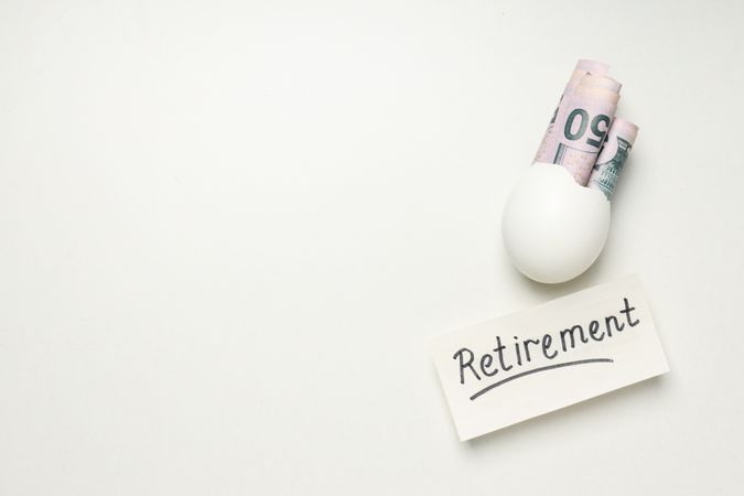 Composition with egg shell and money - retirement