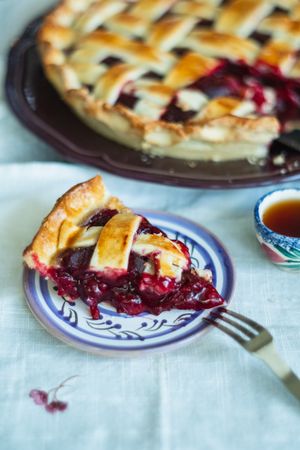 Delicious baked cherry pie with beautiful lattice topping design