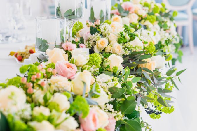 Wedding floral arrangement in long row