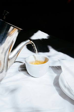 Pouring Coffee into Cup Dark Moody Still Life