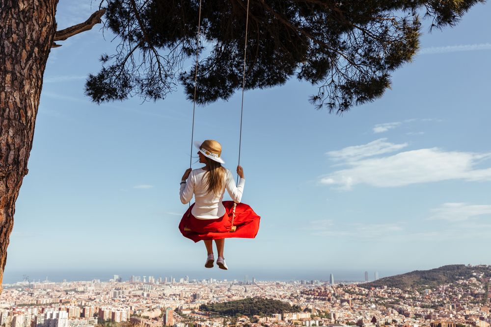 Female having fun on a swing