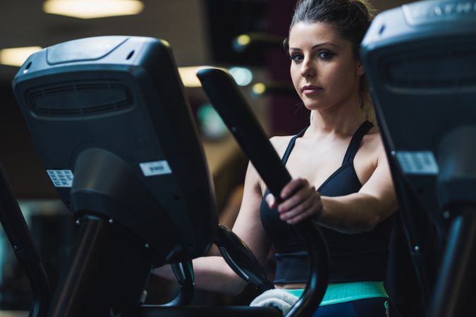 woman on exercise machine