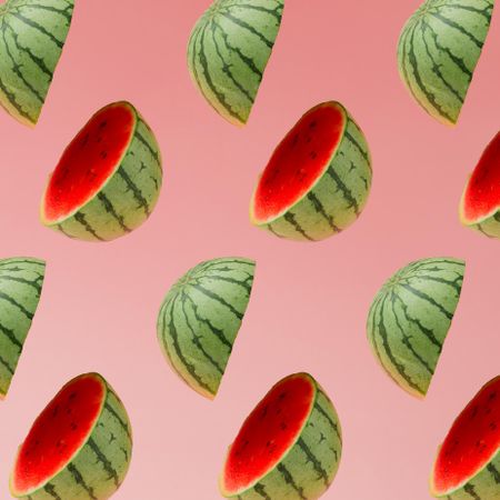 Sliced watermelon pattern on pastel pink background