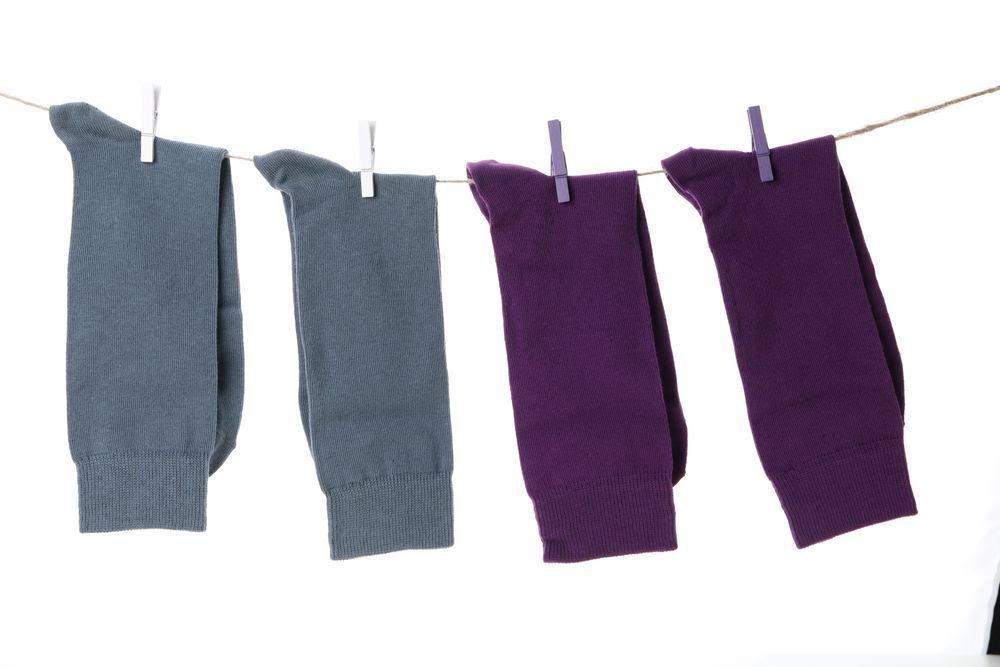 solid color lace up socks, isolated on light background.