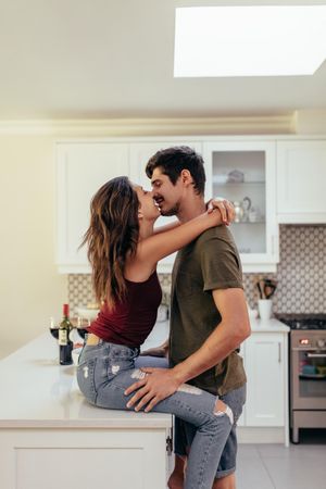 Couple in love kissing at home
