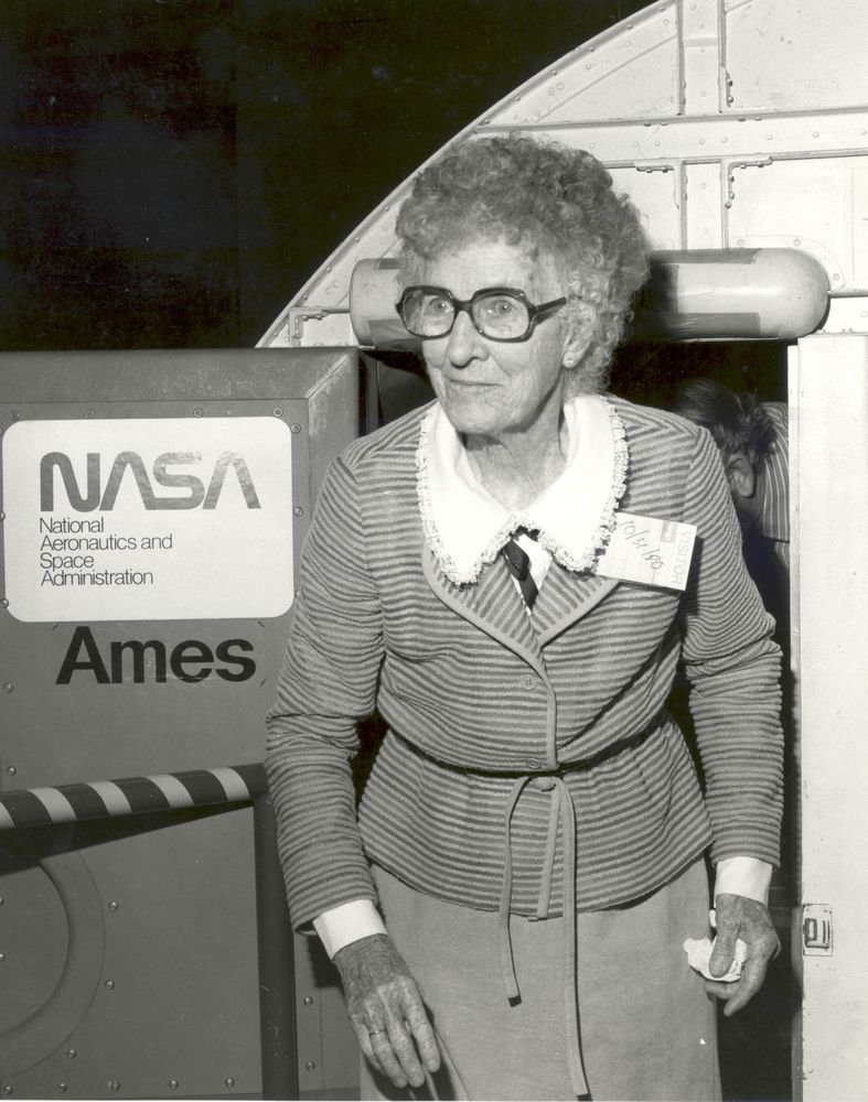 Pilot Neta Snook Southern emerges from a Flight Simulator