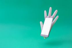 Surgical latex glove and mobile phone