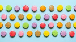 Multi-colored homemade macarons flat lay