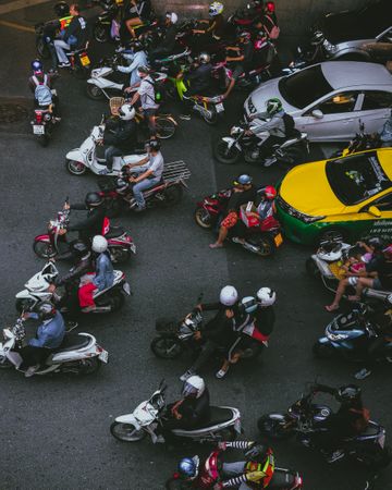 Top view of crowd of people riding motorcycle