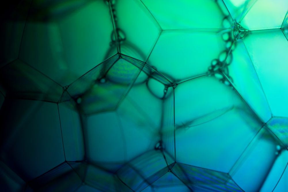 Abstract background bio technology, macro photography foam and water with gradient background. Molecule multicolor backgorund