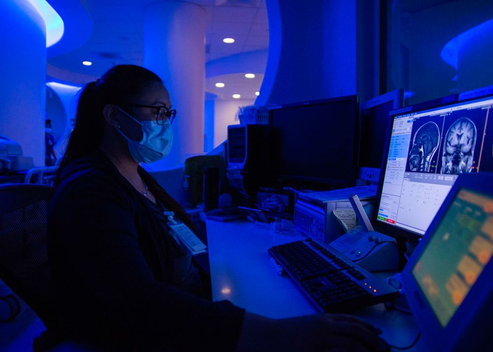 San Diego, CA, USA - Aug 3, 2020: MRI technologist conducts an MRI scan at NMCSD